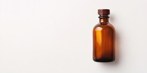 Brown glass bottle with a dark brown cap placed against a white background ample negative space showcasing medical iodine's utility in healthcare.