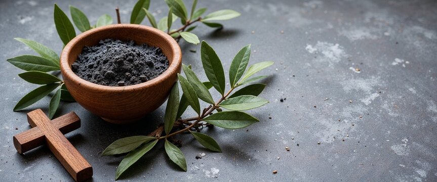 Ash Wednesday: Remember that you are dust, and to dust you shall return. Ash Wednesday: ashes in a wooden bowl with greenery and a cross, symbolizing mortality and repentance