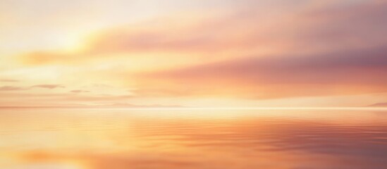 Obraz premium Serene sunset over calm ocean waters, reflecting vibrant sky colors.