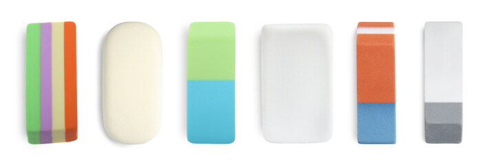 Many different erasers isolated on white, set. Top view