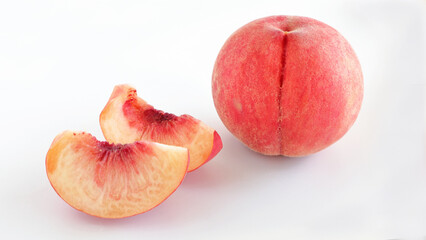 ripe white peaches with cut pieces, summer seasonal fruits