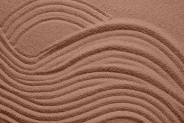 Brown sand with pattern. Mocha mousse - color of 2025 year