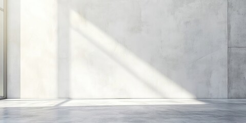 Soft light casts long shadows on a vintage white cement wall with a smooth concrete floor, ideal for graphic design or wallpaper applications.