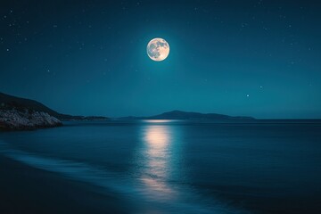 Moonlight reflecting on the calm sea with a rocky coastline and distant mountains