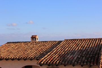 Naklejka premium old tiled roof in the sun