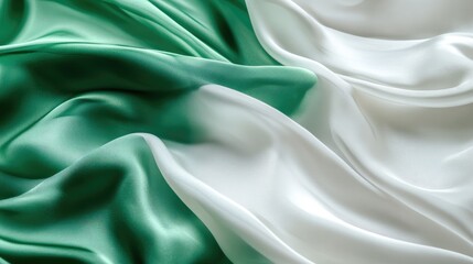 Fototapeta premium Green and white silk fabric texture flowing smooth for elegant fashion and design background collections