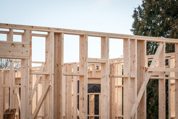 Wooden structures. Wooden frame private house construction. Property developers