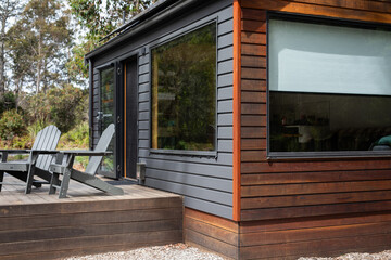 tiny home cabin off the grid remote decking chairs travel