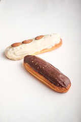 Enjoy our delicious eclairs topped with rich chocolate and crunchy almond toppings