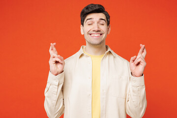 Young man he wears white shirt yellow t-shirt casual clothes waiting for special moment, keeping...