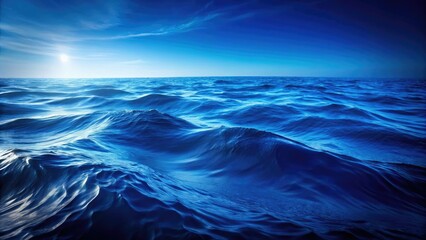 Obraz premium Deep indigo color of the ocean with a subtle wave pattern, ripples, horizon