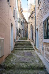 Narrow street without people in old town of Herceg Novi in Montenegro in winter time