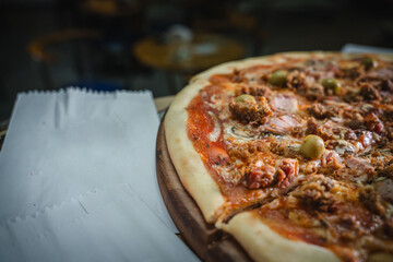 Delicious pizza with varied toppings ready to be served hot