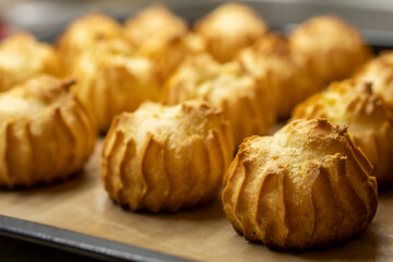 The Making of mini vanilla eclairs.Dessert, profiteroles. Food concept