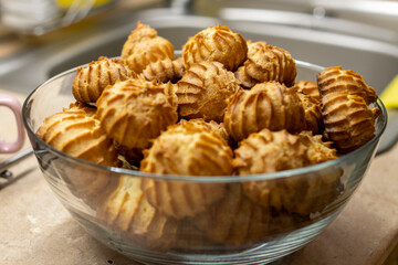 The Making of mini vanilla eclairs.Dessert, profiteroles. Food concept