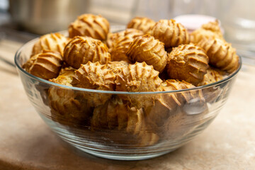 The Making of mini vanilla eclairs.Dessert, profiteroles. Food concept