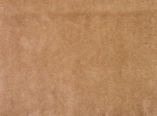 A tan carpet with a pattern of squares