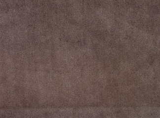 A close up of a brown fabric with a pattern