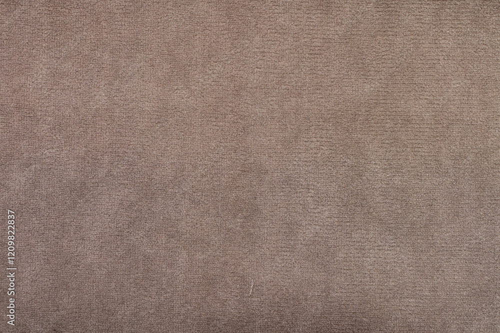 Aufkleber a tan fabric with a pattern of small squares