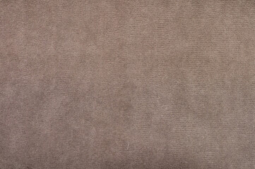 A tan fabric with a pattern of small squares