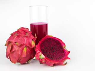 Glass of tasty pitahaya smoothie and fresh dragon fruits - on white background
