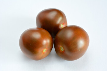 Three Brown Tomatoes close up