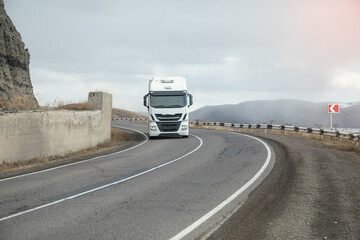 Truck driving at the highways. Transportation. Delivery