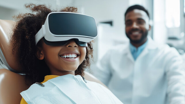 Black girl child in virtual reality glasses smiling while sitting in dentist chair, dentist doctor nearby. Technologies make visiting dentist comfortable