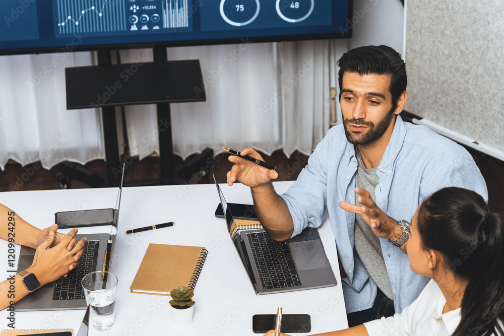 Fototapete Analyst team utilizing BI Fintech to analyze financial data at table in meeting room. Businesspeople analyzing BI dashboard power on paper for business insight and strategic marketing planning.Prudent