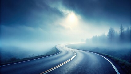Serene Winding Road Through Misty Landscape at Dawn