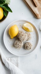 Crispy quinoa balls with lemon wedge on a white plate, elegantly presented
