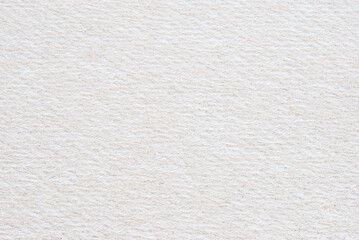 A sheet of beige structure recycled cardboard texture as background