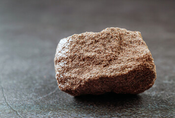 Close-up of sandstone on gray background