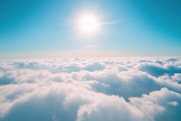 High-angle view of soft clouds in a bright blue sky, serene and airy