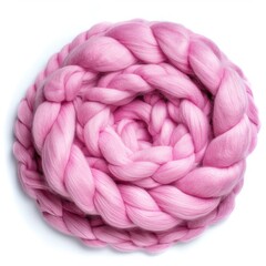Pink merino wool yarn rolled up creating a beautiful texture, perfect for knitting and craft projects