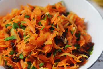 A bowl with traditional Polish carrot salad © nastyakamysheva