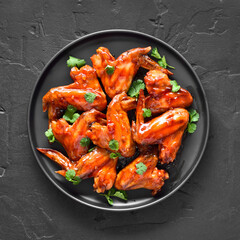 Baked chicken wings on plate