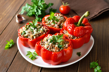 Stuffed red peppers with minced meat, rice, parmesan cheese