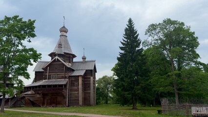 Beautiful Traditional Wooden Church Surrounded by Lush Nature and Scenic Landscapes