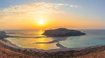 Landscape with Balos Lagoon beach and Gramvousa island at sunset on Crete, Greece © Balate Dorin