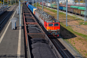 Railway Station with trains. Railroad wagons with coal. Transportation industry	
