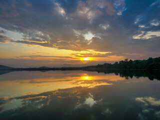 Fototapeta premium Morning light, mountain range, clouds, reflections on water