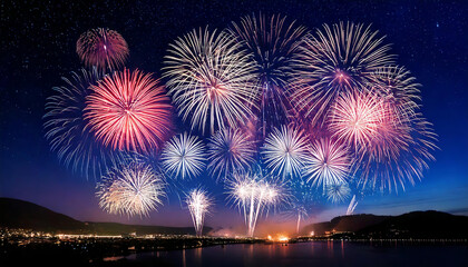 Stunning Fireworks Over a Waterfront City in background at night