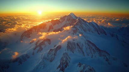 Majestic mountain range at sunset with golden light and clouds in the background