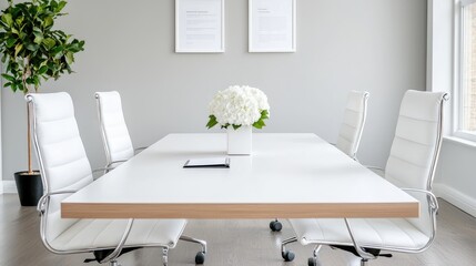 Modern office meeting room, white chairs, floral centerpiece