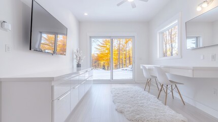 Fototapeta premium Minimalist white room interior features a wall-mounted television, study desk with chairs, and sliding glass doors overlooking a snowy winter forest.