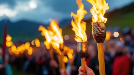 Community torch-lit procession, evening event with flaming torches