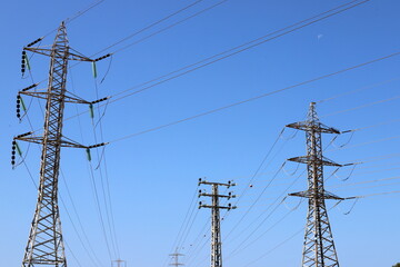Electrical wires that carry high voltage current.