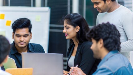 Fototapeta premium Focus on Indian Start-Up Team – Young Indian entrepreneurs collaborating in a co-working space. 