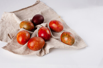 Obraz premium chicken Easter eggs on a linen napkin, copy space